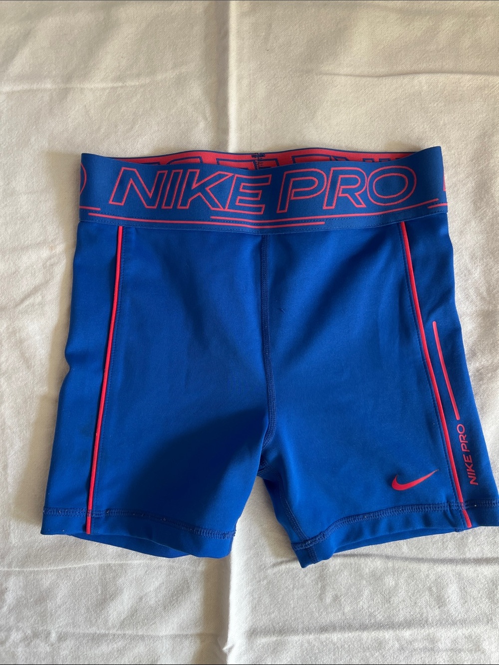 Nike Pro Kids Blue shorts with Pink Accents